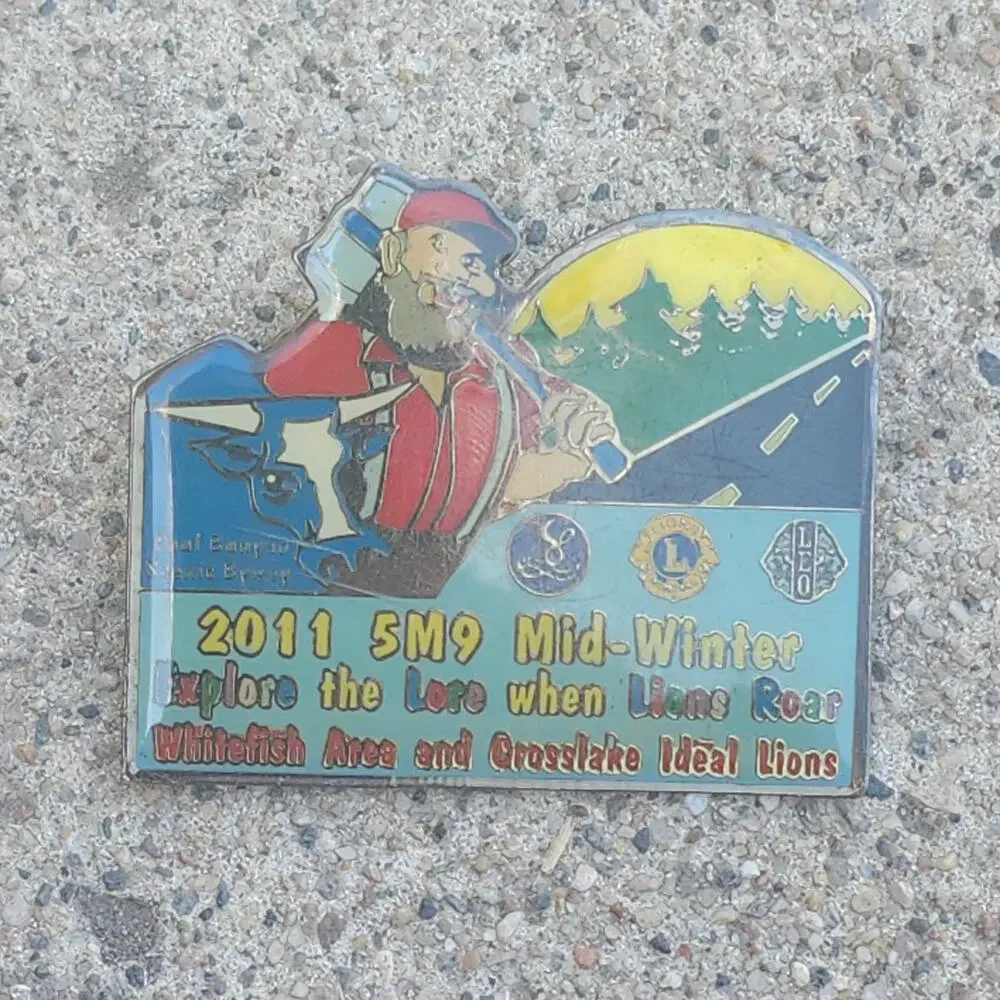 2011 5M9 Mid-Winter Lions Club Pin Whitefish Crosslake Ideal Leo Enamel Badge